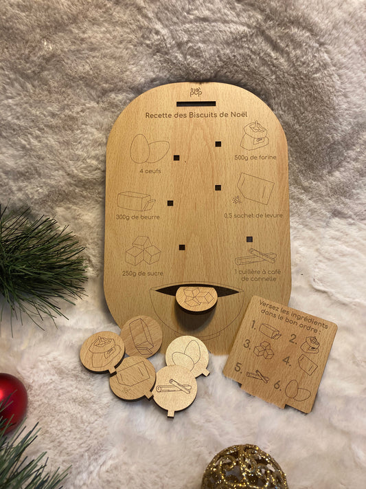 Planche recette Montessori Biscuits de Noël en bois, avec gravures éducatives représentant les ingrédients et des pièces à encastrer